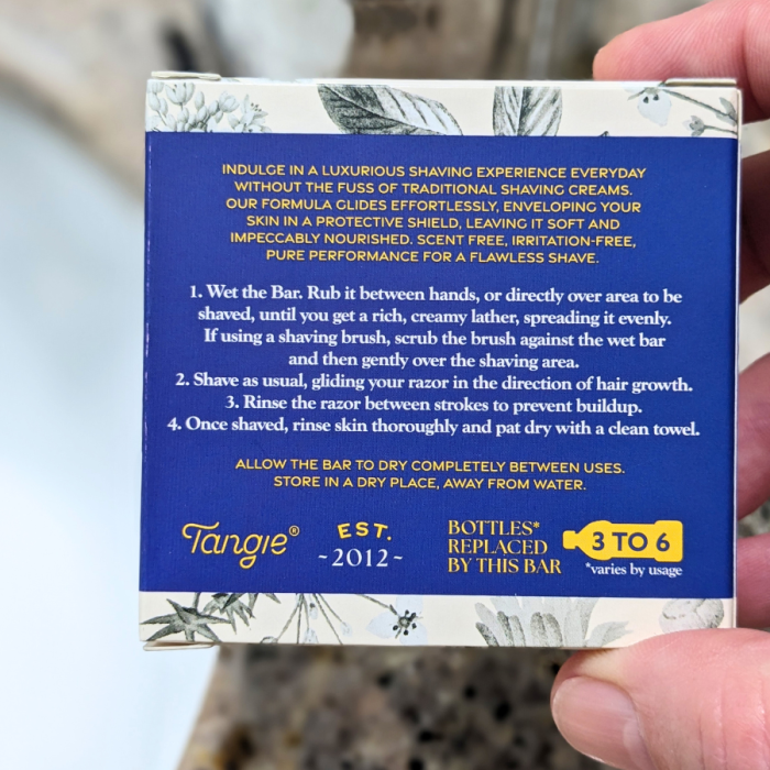 Back of Tangie Shave Bar packaging, displaying product details, usage instructions, ingredients, and certifications for the eco-friendly, plastic-free shave bar.