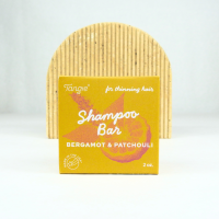 Bergamot Patchouli Shampoo Bar by Tangie in compostable packaging