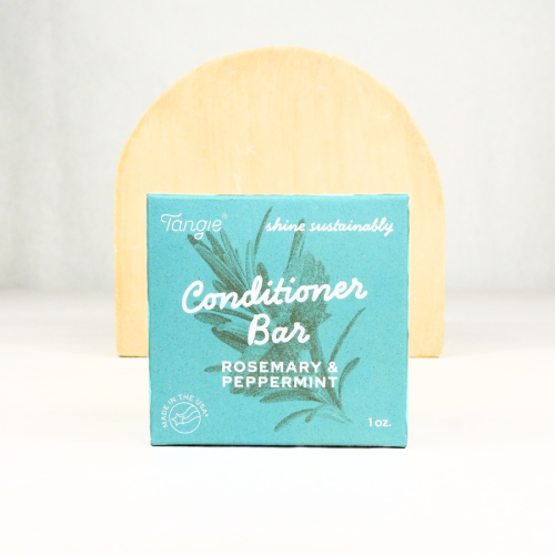 Rosemary Mint Conditioner Bar by Tangie in teal paper box on display arch